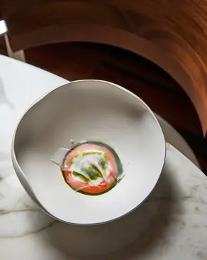 Stracciatella, piselli e lardo di seppia